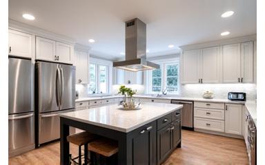 After: Modern kitchen remodel in Surrey with white cabinets and quartz countertops